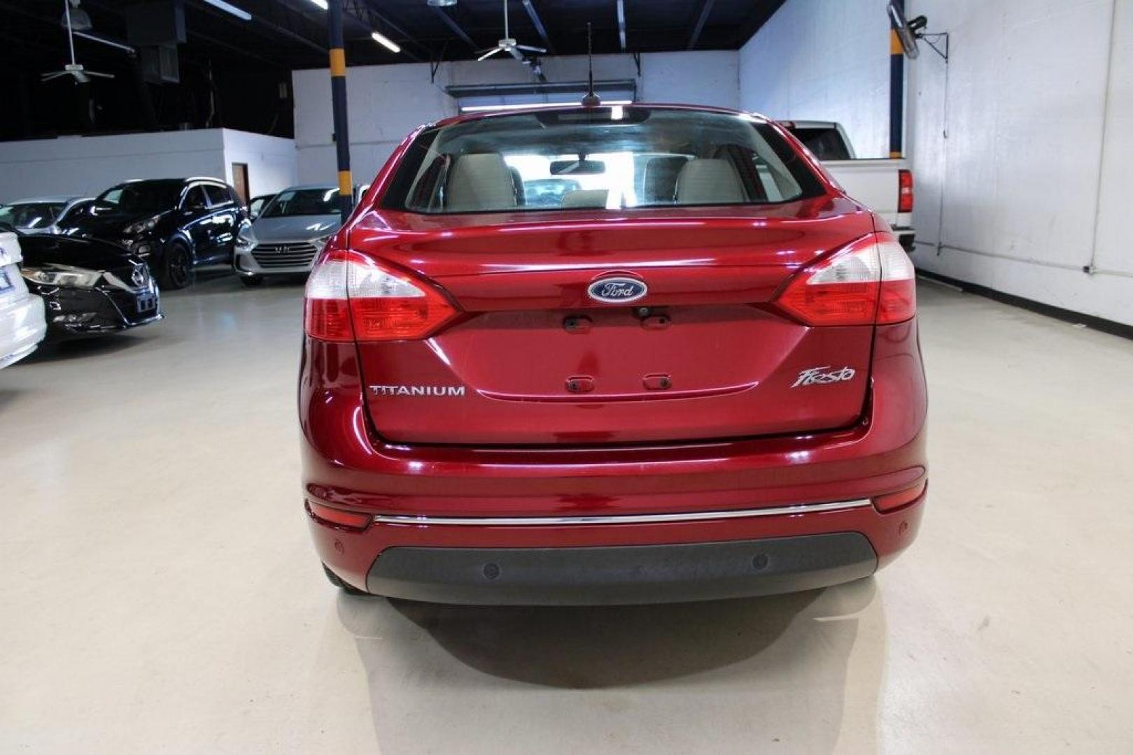 2017 Ruby Red Metallic Tinted Clearcoat Ford Fiesta Titanium (3FADP4CJ8HM) with an 1.6L I4 Ti-VCT engine, Automatic transmission, located at 15300 Midway Rd., Addison, TX, 75001, (972) 702-0011, 32.958321, -96.838074 - Photo#7