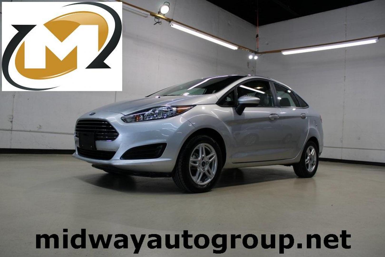 2019 Ingot Silver /Medium Light Stone Ford Fiesta SE (3FADP4BJ9KM) with an 1.6L I4 Ti-VCT engine, Automatic transmission, located at 15300 Midway Rd., Addison, TX, 75001, (972) 702-0011, 32.958321, -96.838074 - Photo#0