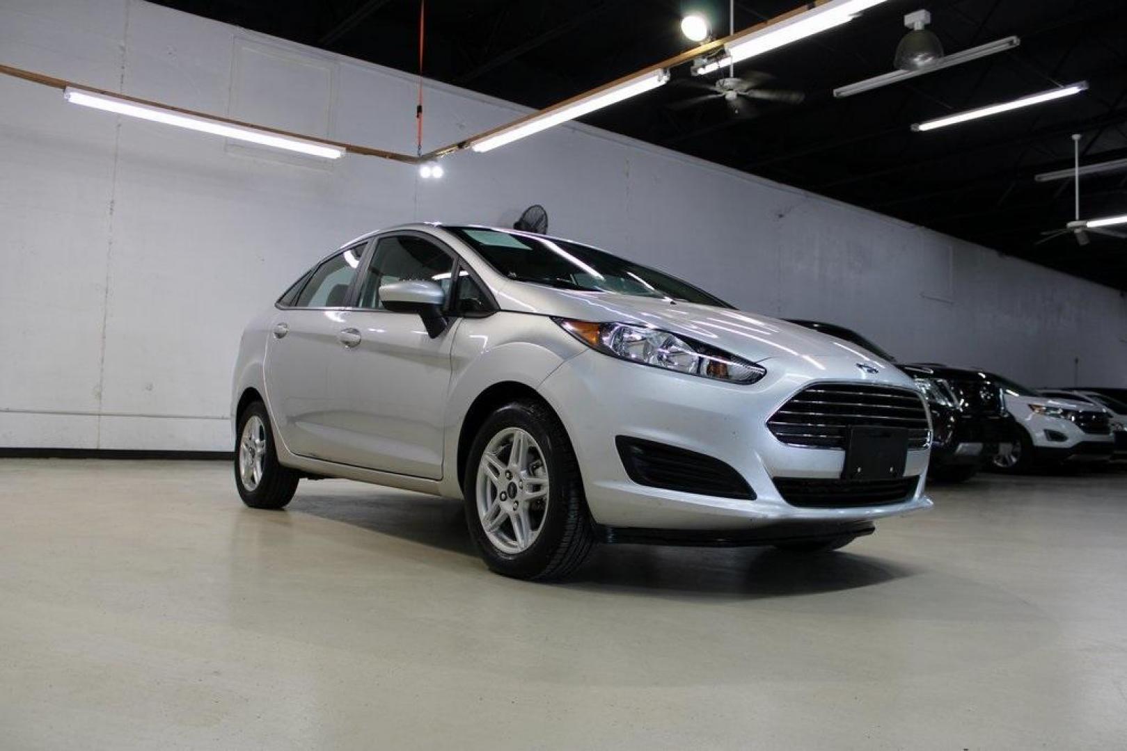 2019 Ingot Silver /Medium Light Stone Ford Fiesta SE (3FADP4BJ9KM) with an 1.6L I4 Ti-VCT engine, Automatic transmission, located at 15300 Midway Rd., Addison, TX, 75001, (972) 702-0011, 32.958321, -96.838074 - Photo#1