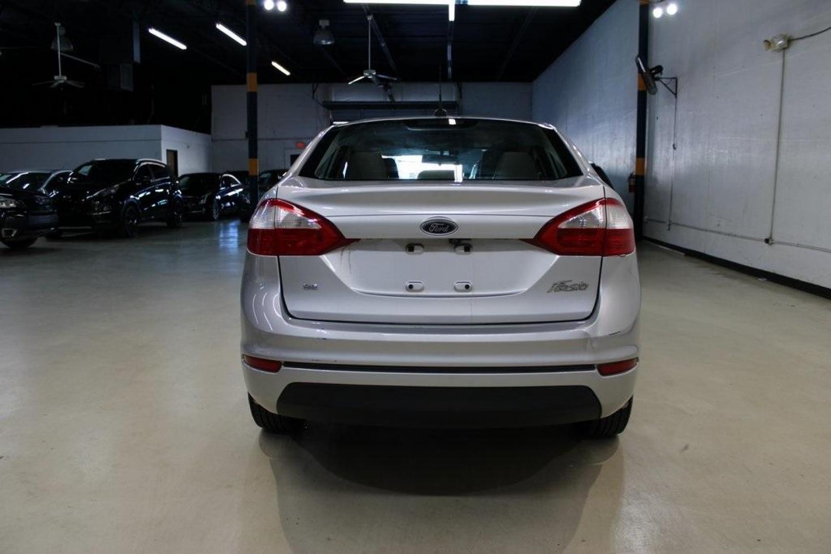 2019 Ingot Silver /Medium Light Stone Ford Fiesta SE (3FADP4BJ9KM) with an 1.6L I4 Ti-VCT engine, Automatic transmission, located at 15300 Midway Rd., Addison, TX, 75001, (972) 702-0011, 32.958321, -96.838074 - Photo#7