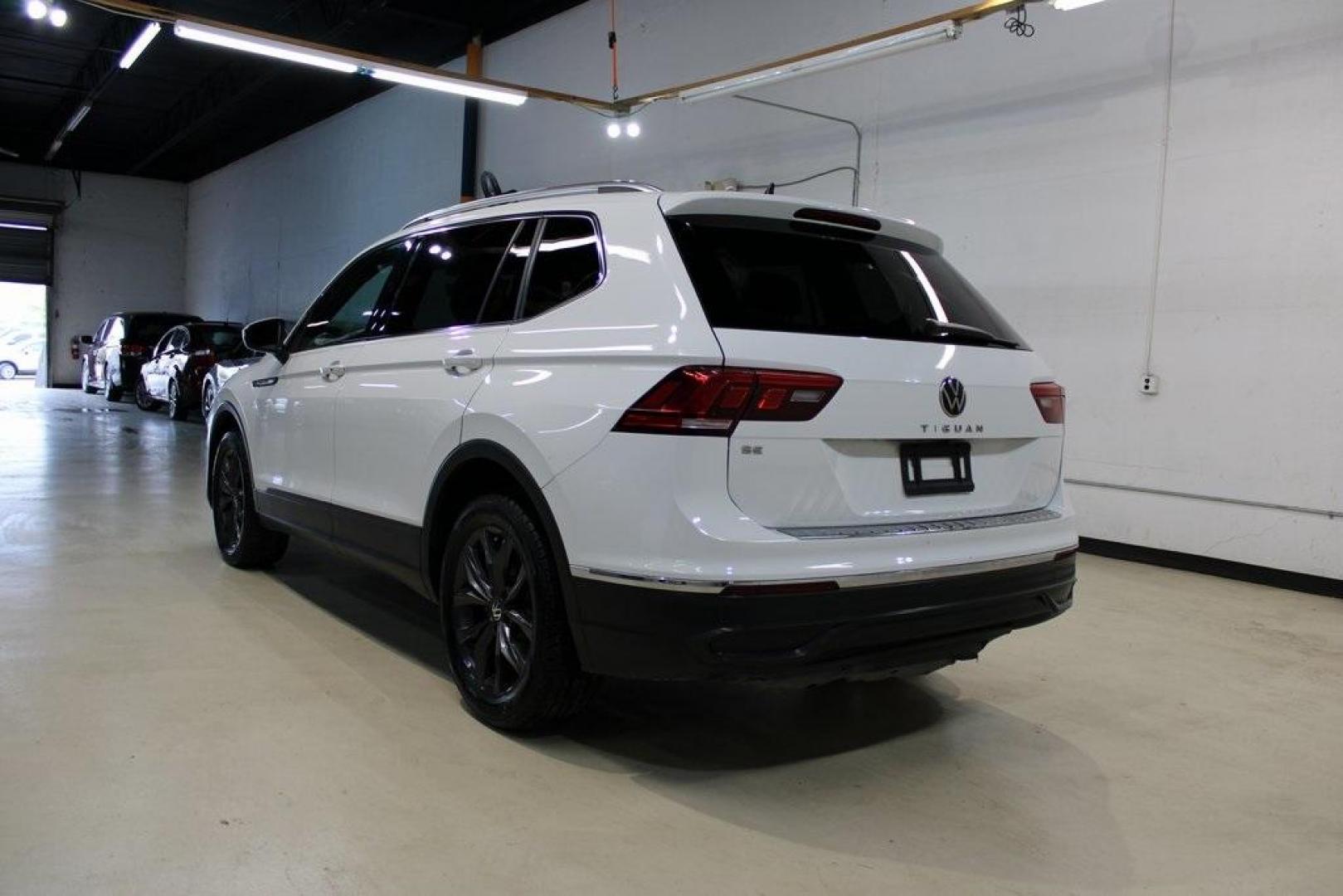 2022 White Volkswagen Tiguan 2.0T SE (3VV3B7AX5NM) with an 2.0L TSI DOHC engine, Automatic transmission, located at 15300 Midway Rd., Addison, TX, 75001, (972) 702-0011, 32.958321, -96.838074 - Photo#2