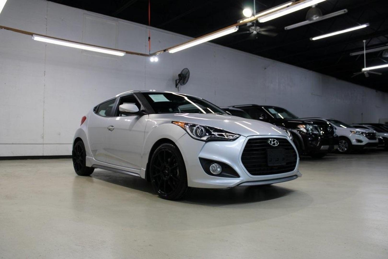 2014 Ironman Silver Metallic /Black Hyundai Veloster Turbo (KMHTC6AEXEU) with an 1.6L I4 DGI DOHC 16V Turbocharged engine, Manual transmission, located at 15300 Midway Rd., Addison, TX, 75001, (972) 702-0011, 32.958321, -96.838074 - Photo#1