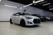 2014 Ironman Silver Metallic /Black Hyundai Veloster Turbo (KMHTC6AEXEU) with an 1.6L I4 DGI DOHC 16V Turbocharged engine, Manual transmission, located at 15300 Midway Rd., Addison, TX, 75001, (972) 702-0011, 32.958321, -96.838074 - Photo#1