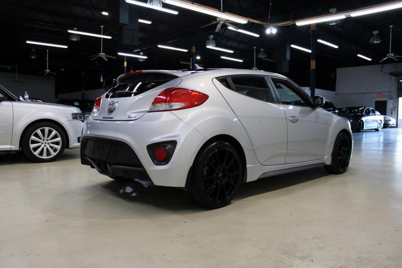 2014 Ironman Silver Metallic /Black Hyundai Veloster Turbo (KMHTC6AEXEU) with an 1.6L I4 DGI DOHC 16V Turbocharged engine, Manual transmission, located at 15300 Midway Rd., Addison, TX, 75001, (972) 702-0011, 32.958321, -96.838074 - Photo#2