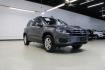 2016 Gray Volkswagen Tiguan S (WVGAV7AX2GW) with an 2.0L 4-Cylinder Turbocharged engine, Automatic transmission, located at 15300 Midway Rd., Addison, TX, 75001, (972) 702-0011, 32.958321, -96.838074 - Photo#1