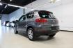 2016 Gray Volkswagen Tiguan S (WVGAV7AX2GW) with an 2.0L 4-Cylinder Turbocharged engine, Automatic transmission, located at 15300 Midway Rd., Addison, TX, 75001, (972) 702-0011, 32.958321, -96.838074 - Photo#3