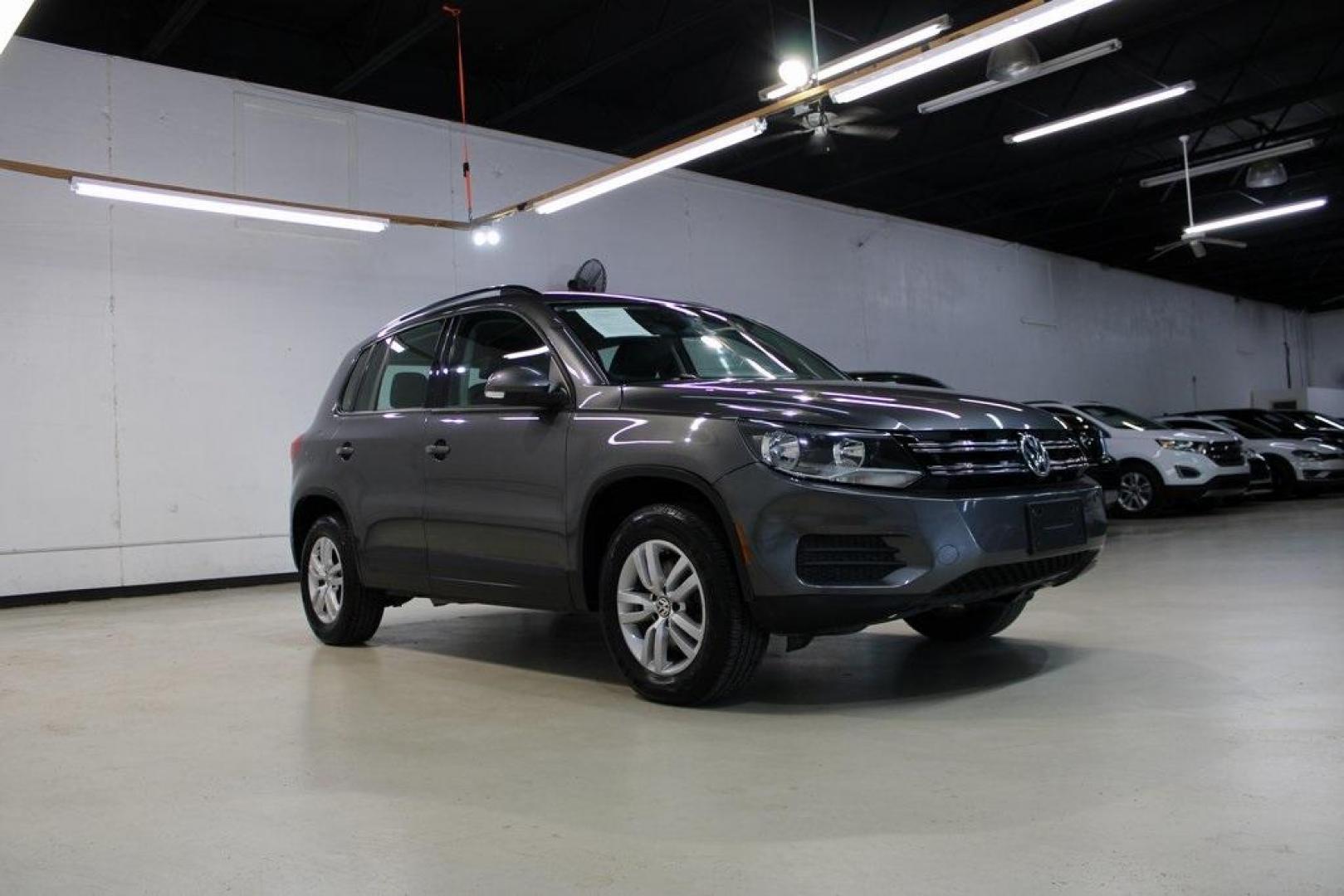 2016 Gray Volkswagen Tiguan S (WVGAV7AX2GW) with an 2.0L 4-Cylinder Turbocharged engine, Automatic transmission, located at 15300 Midway Rd., Addison, TX, 75001, (972) 702-0011, 32.958321, -96.838074 - Photo#6