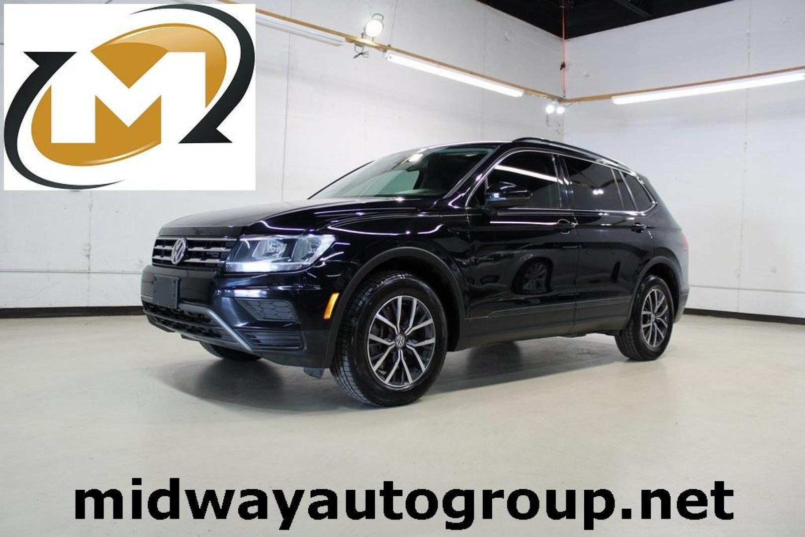 2019 Deep Black Pearl Volkswagen Tiguan 2.0T SE (3VV3B7AX0KM) with an 2.0L TSI DOHC engine, Automatic transmission, located at 15300 Midway Rd., Addison, TX, 75001, (972) 702-0011, 32.958321, -96.838074 - Photo#0