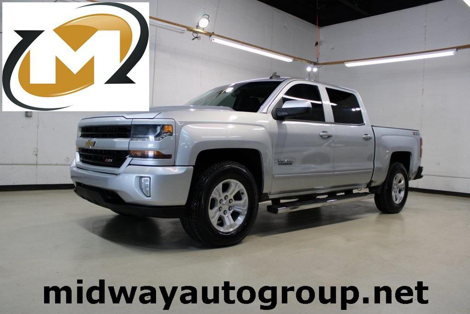 2018 Silver Ice Metallic /Black Chevrolet Silverado 1500 LT (3GCUKREC4JG) with an EcoTec3 5.3L V8 engine, Automatic transmission, located at 15300 Midway Rd., Addison, TX, 75001, (972) 702-0011, 32.958321, -96.838074 - Photo#0