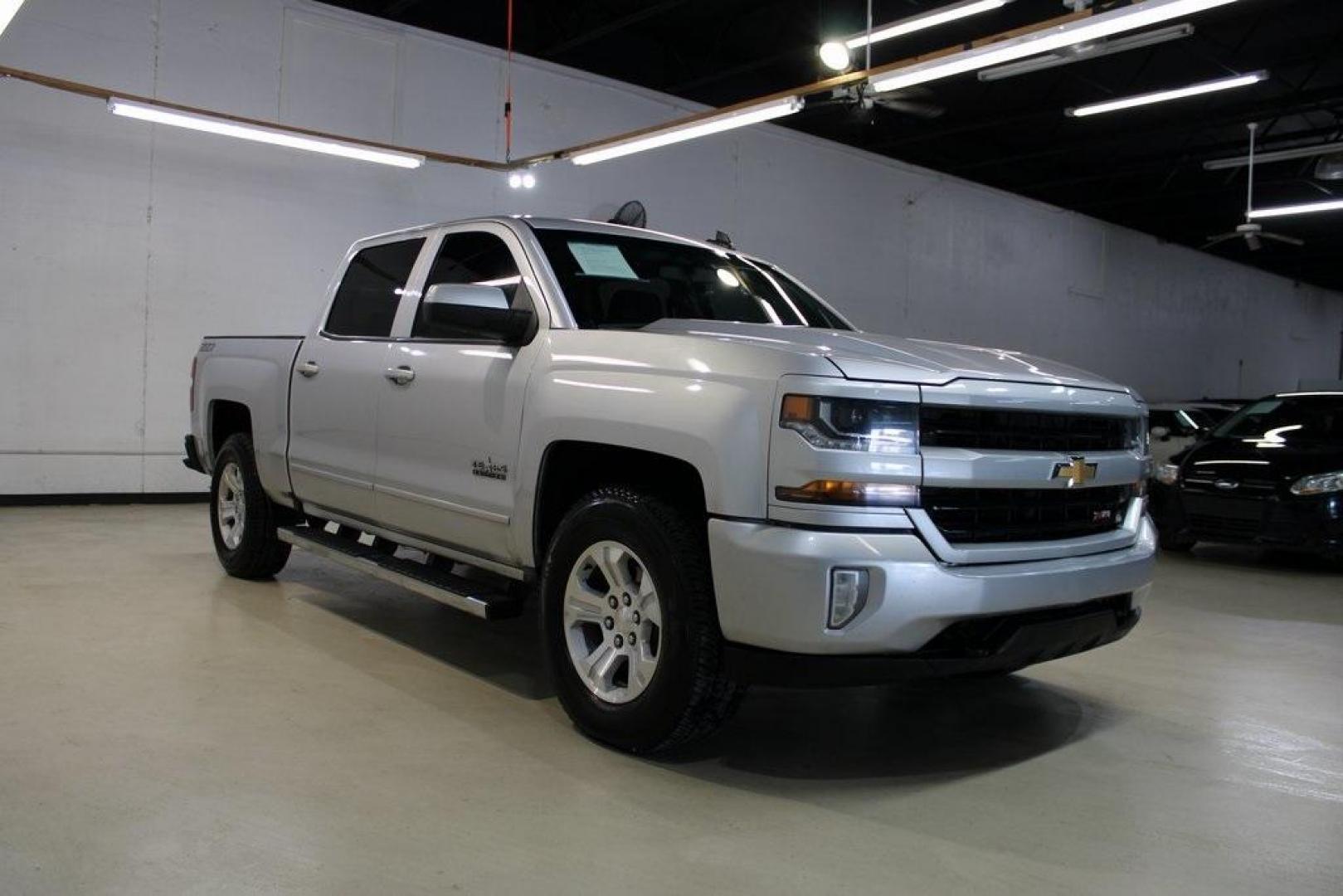 2018 Silver Ice Metallic /Black Chevrolet Silverado 1500 LT (3GCUKREC4JG) with an EcoTec3 5.3L V8 engine, Automatic transmission, located at 15300 Midway Rd., Addison, TX, 75001, (972) 702-0011, 32.958321, -96.838074 - Photo#1