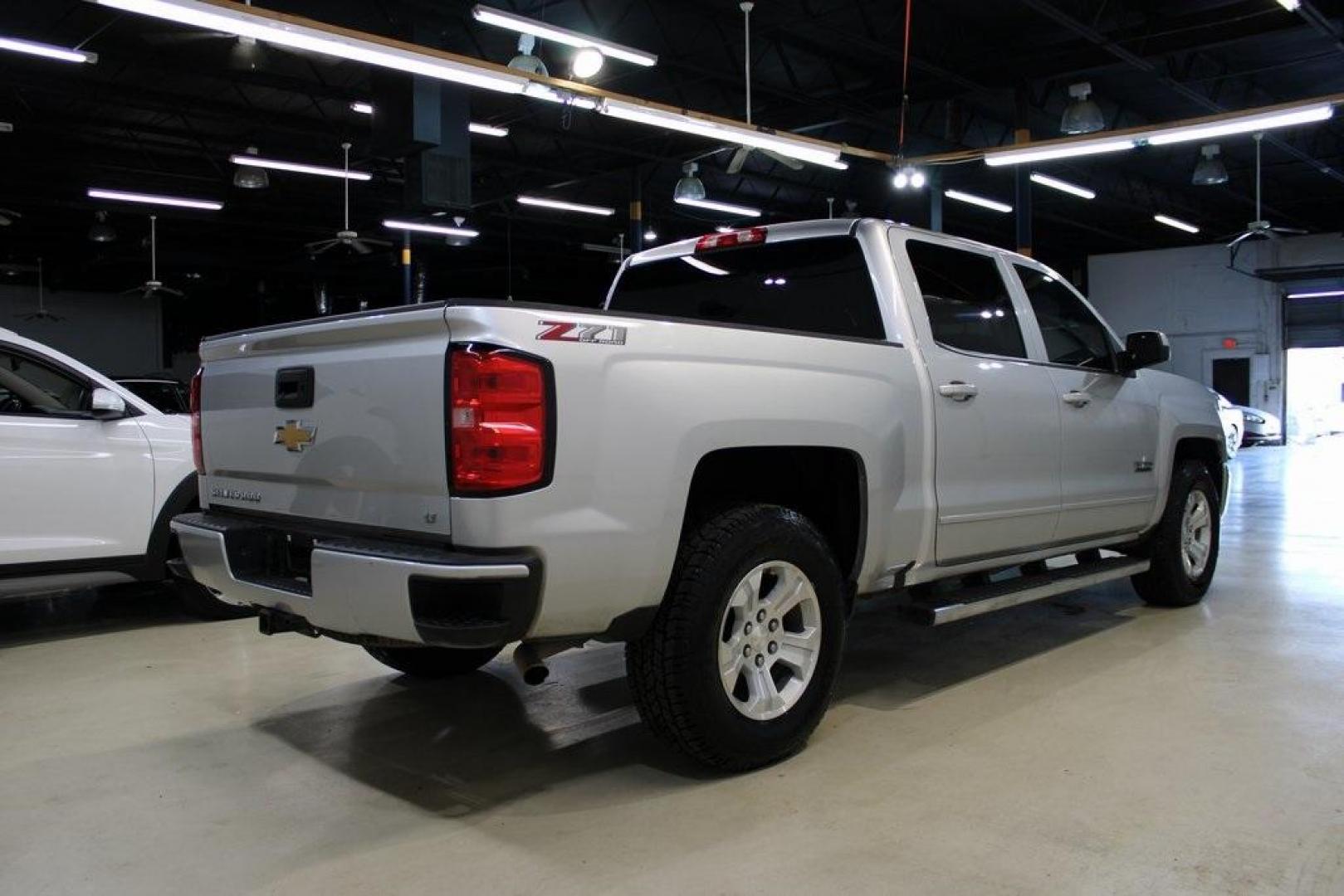 2018 Silver Ice Metallic /Black Chevrolet Silverado 1500 LT (3GCUKREC4JG) with an EcoTec3 5.3L V8 engine, Automatic transmission, located at 15300 Midway Rd., Addison, TX, 75001, (972) 702-0011, 32.958321, -96.838074 - Photo#2