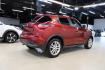 2015 Cayenne Red Pearl /Black/Red Nissan Juke SV (JN8AF5MR4FT) with an 1.6L I4 DOHC 16V engine, CVT transmission, located at 15300 Midway Rd., Addison, TX, 75001, (972) 702-0011, 32.958321, -96.838074 - HOME OF THE NO HAGGLE PRICE - WHOLESALE PRICES TO THE PUBLIC!! Juke SV, 4D Sport Utility, 1.6L I4 DOHC 16V, CVT with Xtronic, FWD, Cayenne Red Pearl, Black/Red Cloth.<br><br>Cayenne Red Pearl 2015 Nissan Juke SV<br><br>Recent Arrival! 28/32 City/Highway MPG<br><br><br>At Midway Auto Group, we strive - Photo#2