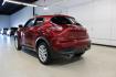 2015 Cayenne Red Pearl /Black/Red Nissan Juke SV (JN8AF5MR4FT) with an 1.6L I4 DOHC 16V engine, CVT transmission, located at 15300 Midway Rd., Addison, TX, 75001, (972) 702-0011, 32.958321, -96.838074 - HOME OF THE NO HAGGLE PRICE - WHOLESALE PRICES TO THE PUBLIC!! Juke SV, 4D Sport Utility, 1.6L I4 DOHC 16V, CVT with Xtronic, FWD, Cayenne Red Pearl, Black/Red Cloth.<br><br>Cayenne Red Pearl 2015 Nissan Juke SV<br><br>Recent Arrival! 28/32 City/Highway MPG<br><br><br>At Midway Auto Group, we strive - Photo#3