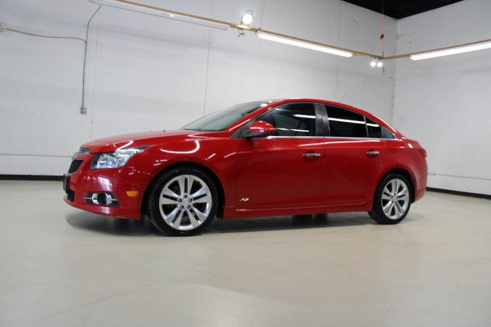 2013 Victory Red /Black Chevrolet Cruze LTZ (1G1PG5SB6D7) with an ECOTEC 1.4L I4 SMPI DOHC Turbocharged VVT engine, Automatic transmission, located at 15300 Midway Rd., Addison, TX, 75001, (972) 702-0011, 32.958321, -96.838074 - Photo#4