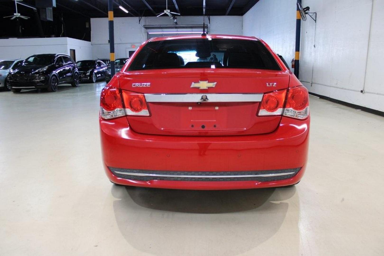 2013 Victory Red /Black Chevrolet Cruze LTZ (1G1PG5SB6D7) with an ECOTEC 1.4L I4 SMPI DOHC Turbocharged VVT engine, Automatic transmission, located at 15300 Midway Rd., Addison, TX, 75001, (972) 702-0011, 32.958321, -96.838074 - Photo#8