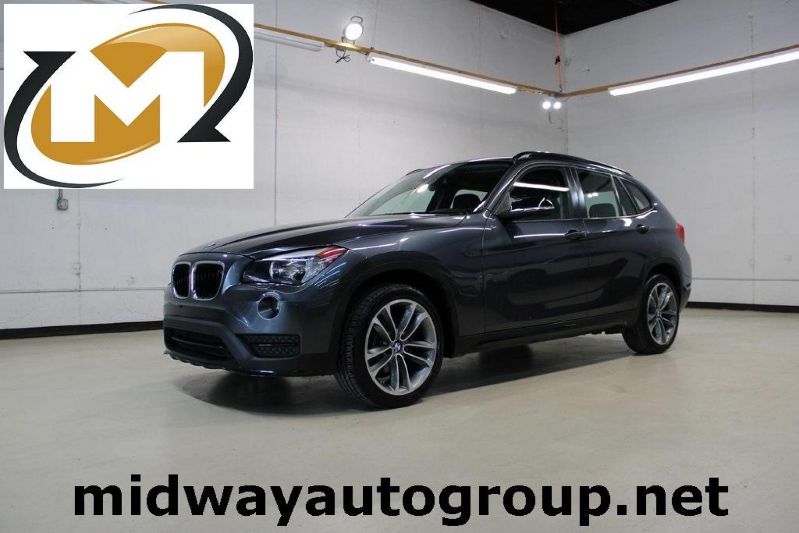 2015 Mineral Grey Metallic /Black BMW X1 xDrive28i (WBAVL1C56FV) with an 2.0L 4-Cylinder DOHC 16V TwinPower Turbo engine, Automatic transmission, located at 15300 Midway Rd., Addison, TX, 75001, (972) 702-0011, 32.958321, -96.838074 - Photo#0