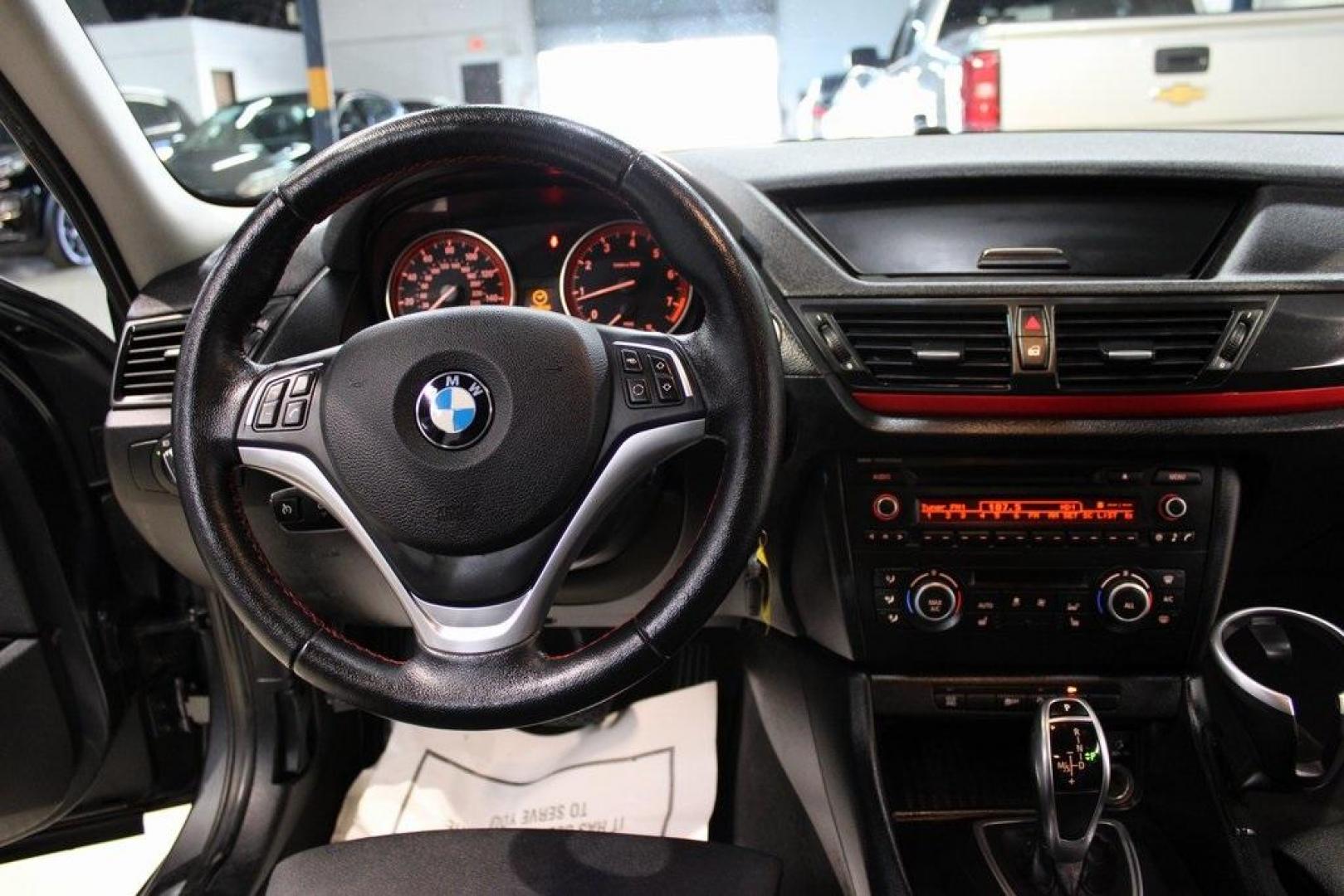 2015 Mineral Grey Metallic /Black BMW X1 xDrive28i (WBAVL1C56FV) with an 2.0L 4-Cylinder DOHC 16V TwinPower Turbo engine, Automatic transmission, located at 15300 Midway Rd., Addison, TX, 75001, (972) 702-0011, 32.958321, -96.838074 - Photo#17