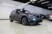 2015 Mineral Grey Metallic /Black BMW X1 xDrive28i (WBAVL1C56FV) with an 2.0L 4-Cylinder DOHC 16V TwinPower Turbo engine, Automatic transmission, located at 15300 Midway Rd., Addison, TX, 75001, (972) 702-0011, 32.958321, -96.838074 - Photo#1