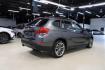 2015 Mineral Grey Metallic /Black BMW X1 xDrive28i (WBAVL1C56FV) with an 2.0L 4-Cylinder DOHC 16V TwinPower Turbo engine, Automatic transmission, located at 15300 Midway Rd., Addison, TX, 75001, (972) 702-0011, 32.958321, -96.838074 - Photo#2