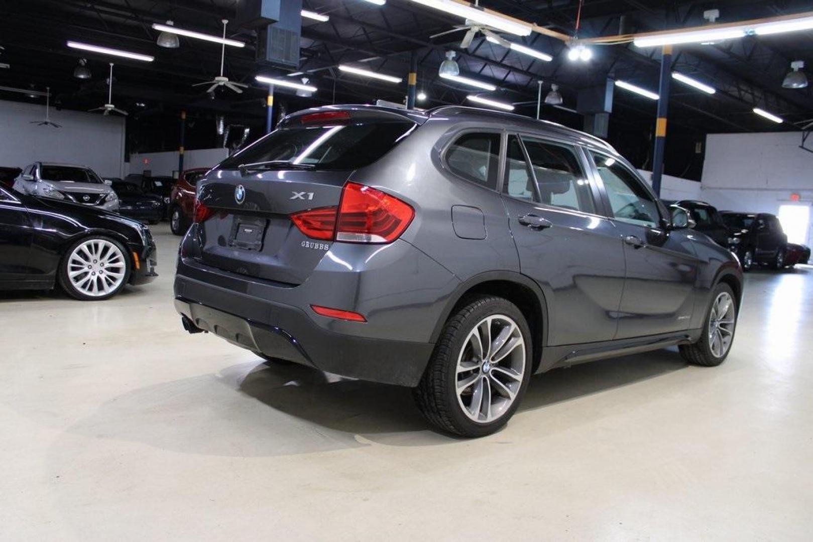 2015 Mineral Grey Metallic /Black BMW X1 xDrive28i (WBAVL1C56FV) with an 2.0L 4-Cylinder DOHC 16V TwinPower Turbo engine, Automatic transmission, located at 15300 Midway Rd., Addison, TX, 75001, (972) 702-0011, 32.958321, -96.838074 - Photo#2