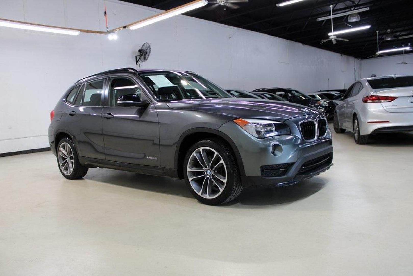 2015 Mineral Grey Metallic /Black BMW X1 xDrive28i (WBAVL1C56FV) with an 2.0L 4-Cylinder DOHC 16V TwinPower Turbo engine, Automatic transmission, located at 15300 Midway Rd., Addison, TX, 75001, (972) 702-0011, 32.958321, -96.838074 - Photo#6