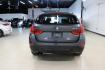 2015 Mineral Grey Metallic /Black BMW X1 xDrive28i (WBAVL1C56FV) with an 2.0L 4-Cylinder DOHC 16V TwinPower Turbo engine, Automatic transmission, located at 15300 Midway Rd., Addison, TX, 75001, (972) 702-0011, 32.958321, -96.838074 - Photo#7