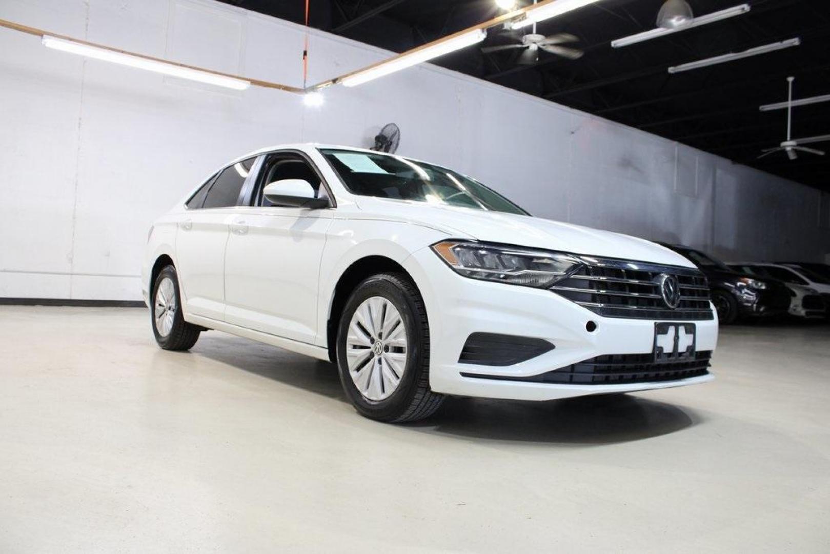 2019 White Volkswagen Jetta 1.4T S (3VWCB7BUXKM) with an 1.4L TSI engine, Automatic transmission, located at 15300 Midway Rd., Addison, TX, 75001, (972) 702-0011, 32.958321, -96.838074 - Photo#1