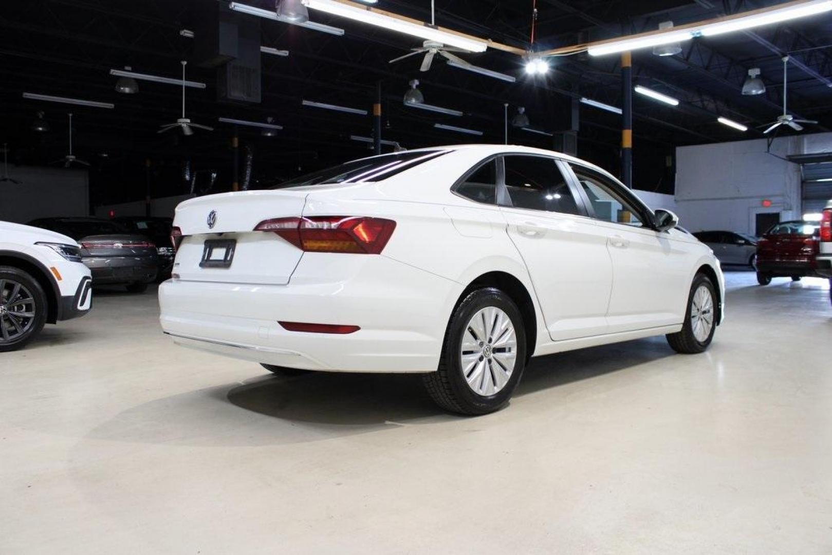 2019 White Volkswagen Jetta 1.4T S (3VWCB7BUXKM) with an 1.4L TSI engine, Automatic transmission, located at 15300 Midway Rd., Addison, TX, 75001, (972) 702-0011, 32.958321, -96.838074 - Photo#2