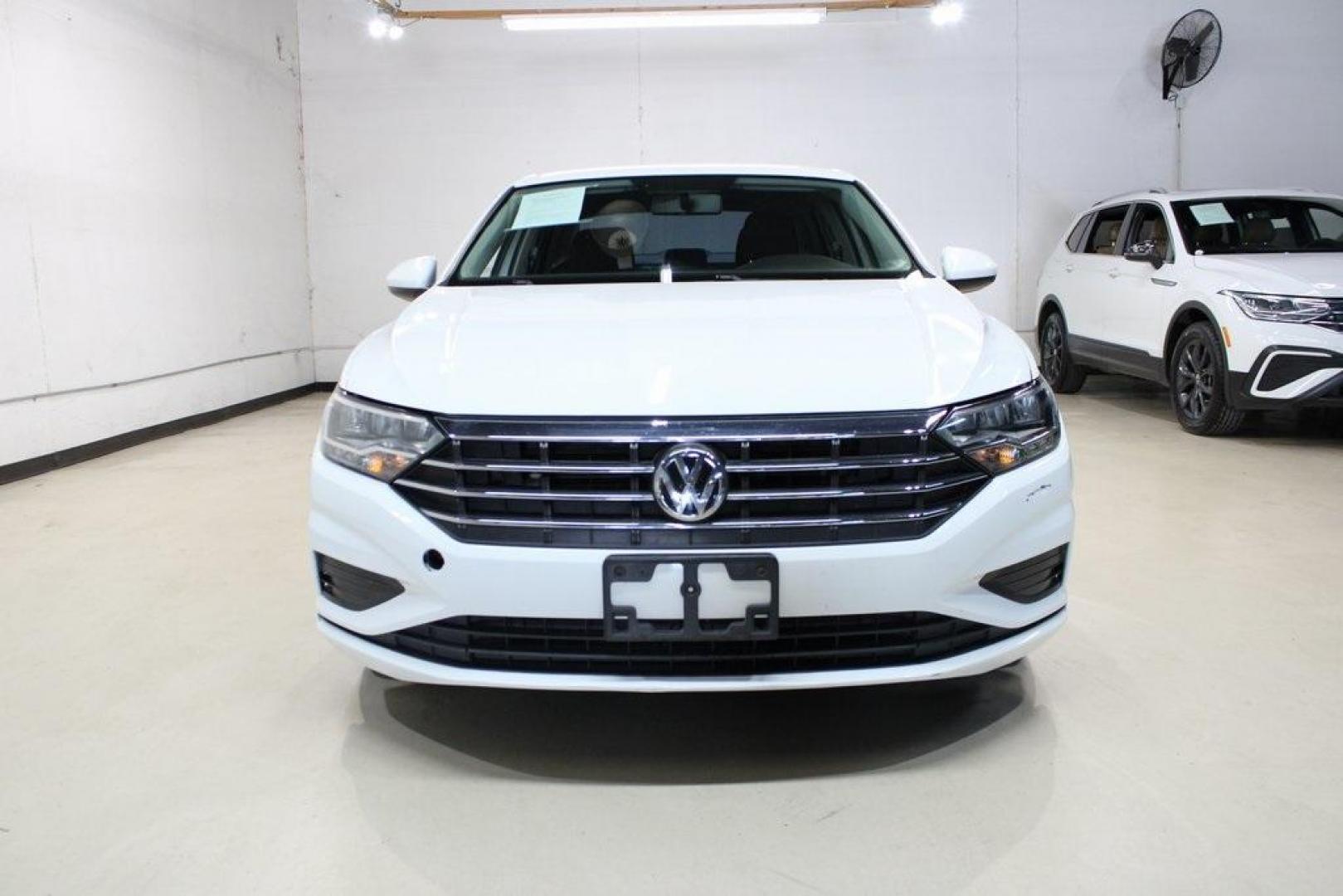 2019 White Volkswagen Jetta 1.4T S (3VWCB7BUXKM) with an 1.4L TSI engine, Automatic transmission, located at 15300 Midway Rd., Addison, TX, 75001, (972) 702-0011, 32.958321, -96.838074 - Photo#5