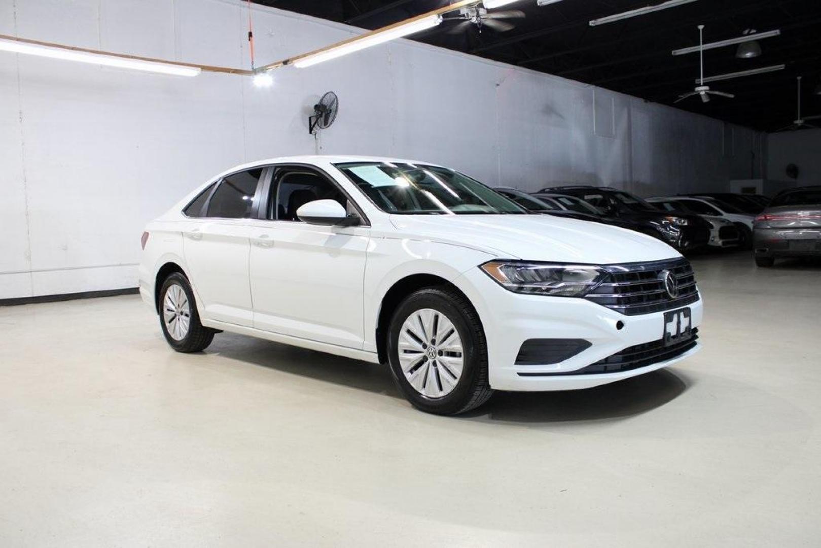 2019 White Volkswagen Jetta 1.4T S (3VWCB7BUXKM) with an 1.4L TSI engine, Automatic transmission, located at 15300 Midway Rd., Addison, TX, 75001, (972) 702-0011, 32.958321, -96.838074 - Photo#6