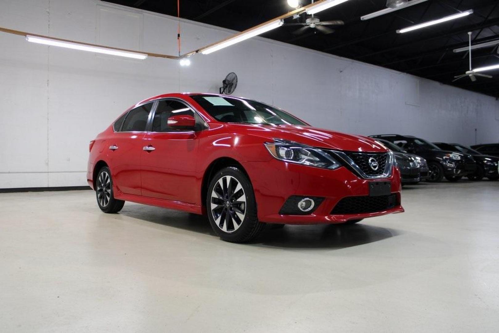 2019 Red Alert /Charcoal Nissan Sentra SR (3N1AB7AP1KY) with an 1.8L 4-Cylinder DOHC 16V engine, CVT transmission, located at 15300 Midway Rd., Addison, TX, 75001, (972) 702-0011, 32.958321, -96.838074 - HOME OF THE NO HAGGLE PRICE - WHOLESALE PRICES TO THE PUBLIC!! Sentra SR, 4D Sedan, 1.8L 4-Cylinder DOHC 16V, CVT with Xtronic, FWD, Red Alert, Charcoal Cloth.<br><br>Red Alert 2019 Nissan Sentra SR<br><br>29/37 City/Highway MPG<br><br><br>At Midway Auto Group, we strive to provide you with the best - Photo#1