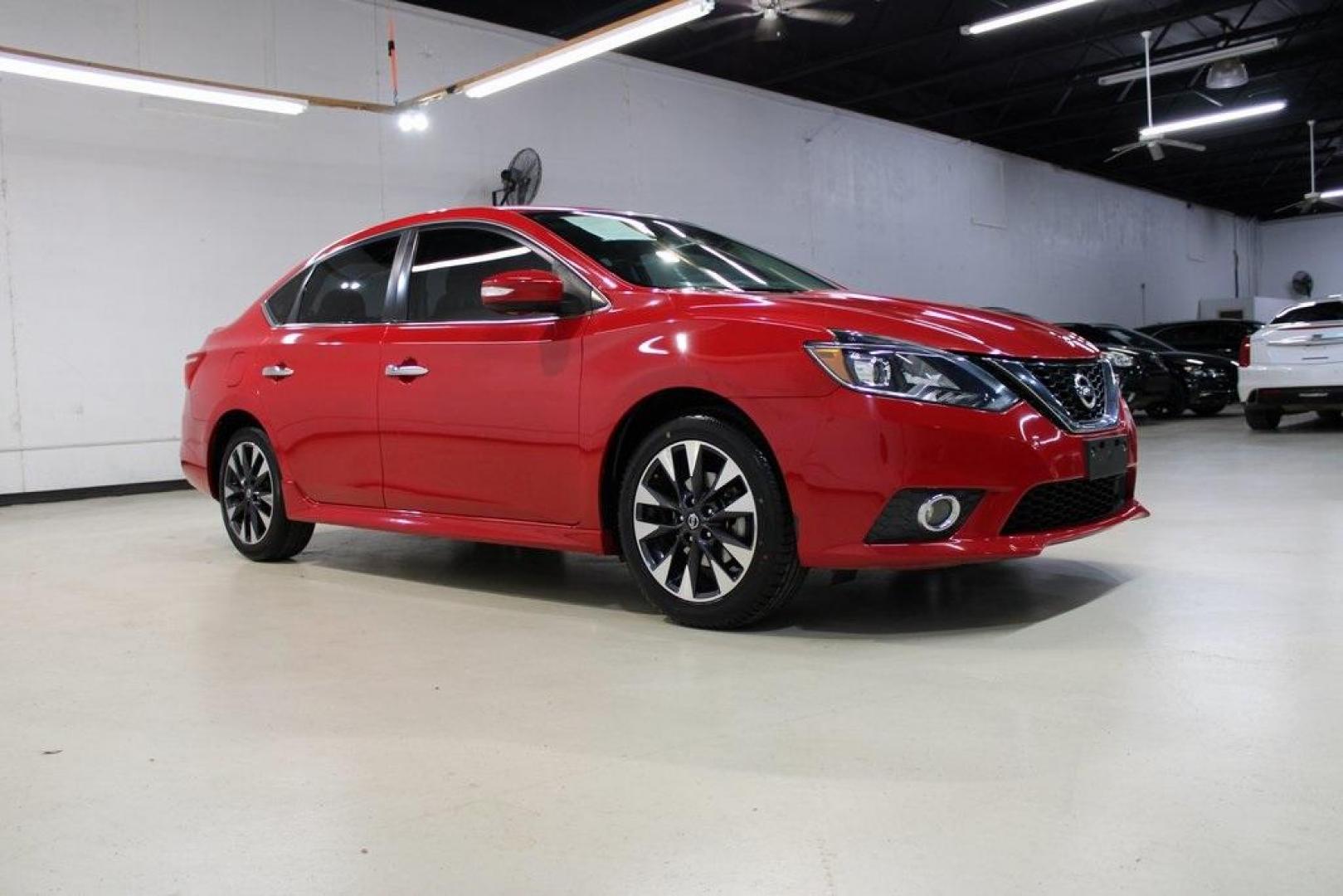 2019 Red Alert /Charcoal Nissan Sentra SR (3N1AB7AP1KY) with an 1.8L 4-Cylinder DOHC 16V engine, CVT transmission, located at 15300 Midway Rd., Addison, TX, 75001, (972) 702-0011, 32.958321, -96.838074 - HOME OF THE NO HAGGLE PRICE - WHOLESALE PRICES TO THE PUBLIC!! Sentra SR, 4D Sedan, 1.8L 4-Cylinder DOHC 16V, CVT with Xtronic, FWD, Red Alert, Charcoal Cloth.<br><br>Red Alert 2019 Nissan Sentra SR<br><br>29/37 City/Highway MPG<br><br><br>At Midway Auto Group, we strive to provide you with the best - Photo#6