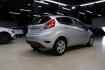 2016 Ingot Silver /Black Ford Fiesta SE (3FADP4EJ0GM) with an 1.6L I4 Ti-VCT engine, Automatic transmission, located at 15300 Midway Rd., Addison, TX, 75001, (972) 702-0011, 32.958321, -96.838074 - Photo#2