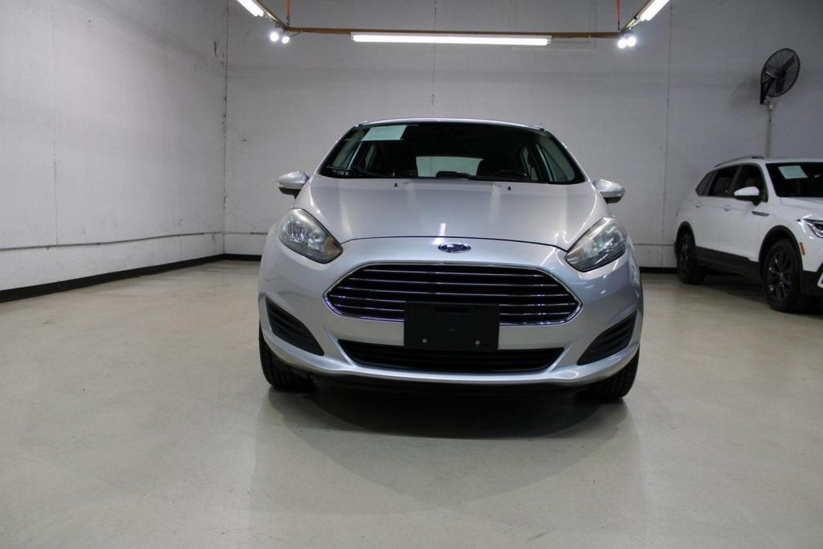 2016 Ingot Silver /Black Ford Fiesta SE (3FADP4EJ0GM) with an 1.6L I4 Ti-VCT engine, Automatic transmission, located at 15300 Midway Rd., Addison, TX, 75001, (972) 702-0011, 32.958321, -96.838074 - Photo#5