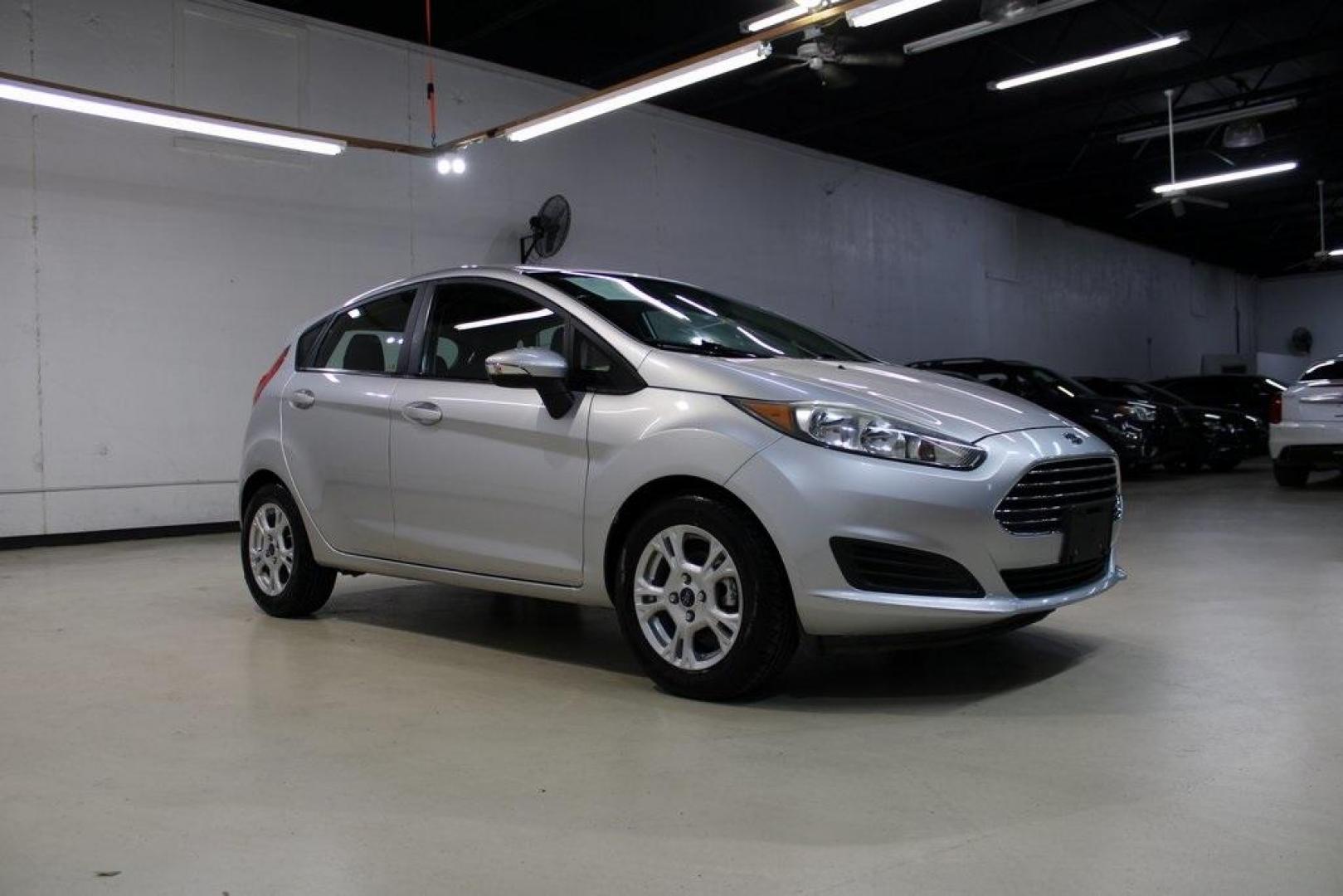 2016 Ingot Silver /Black Ford Fiesta SE (3FADP4EJ0GM) with an 1.6L I4 Ti-VCT engine, Automatic transmission, located at 15300 Midway Rd., Addison, TX, 75001, (972) 702-0011, 32.958321, -96.838074 - Photo#6