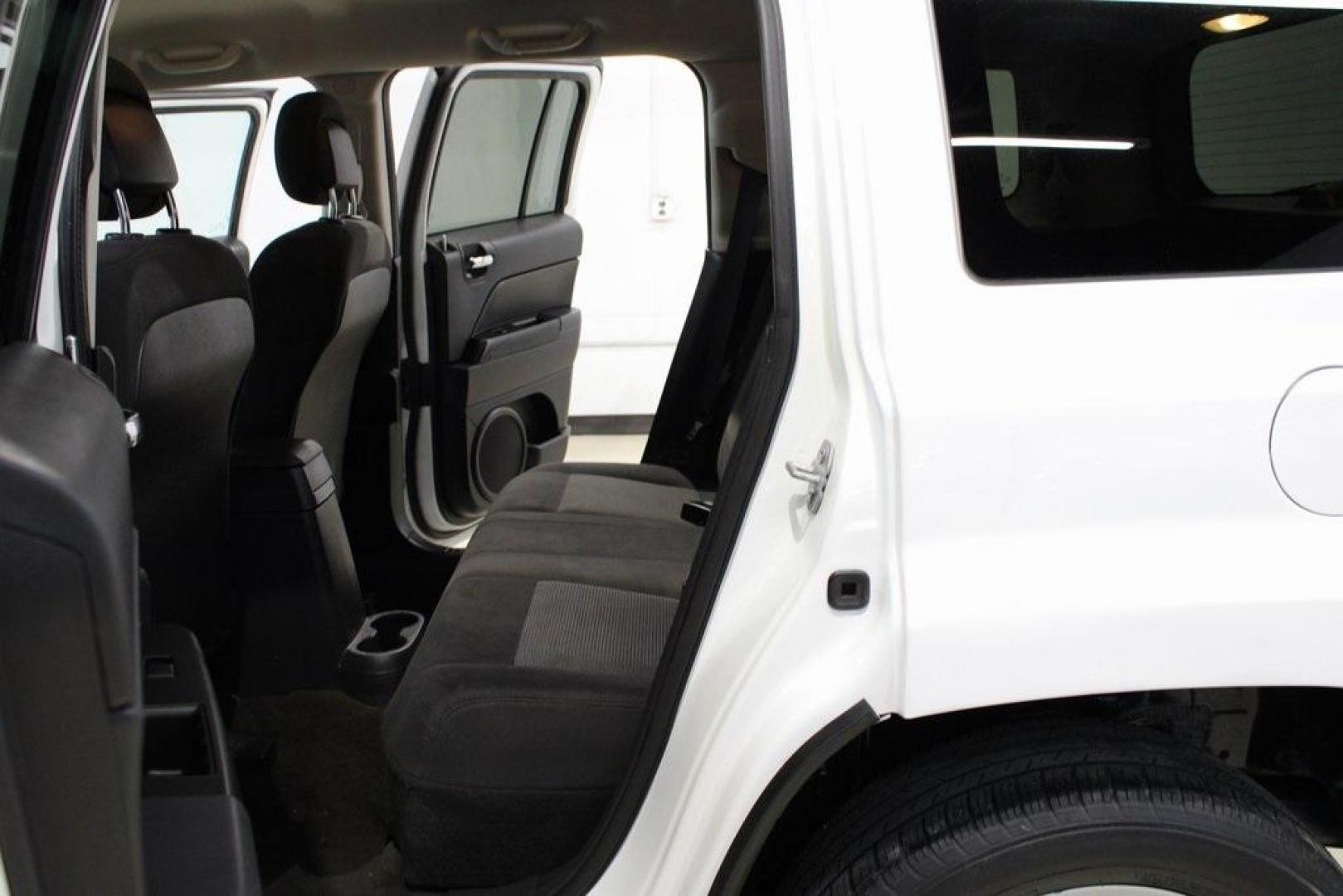 2017 Bright White Clearcoat /Dark Slate Gray Jeep Patriot Latitude (1C4NJPFA0HD) with an 2.0L I4 DOHC 16V Dual VVT engine, CVT transmission, located at 15300 Midway Rd., Addison, TX, 75001, (972) 702-0011, 32.958321, -96.838074 - Photo#17