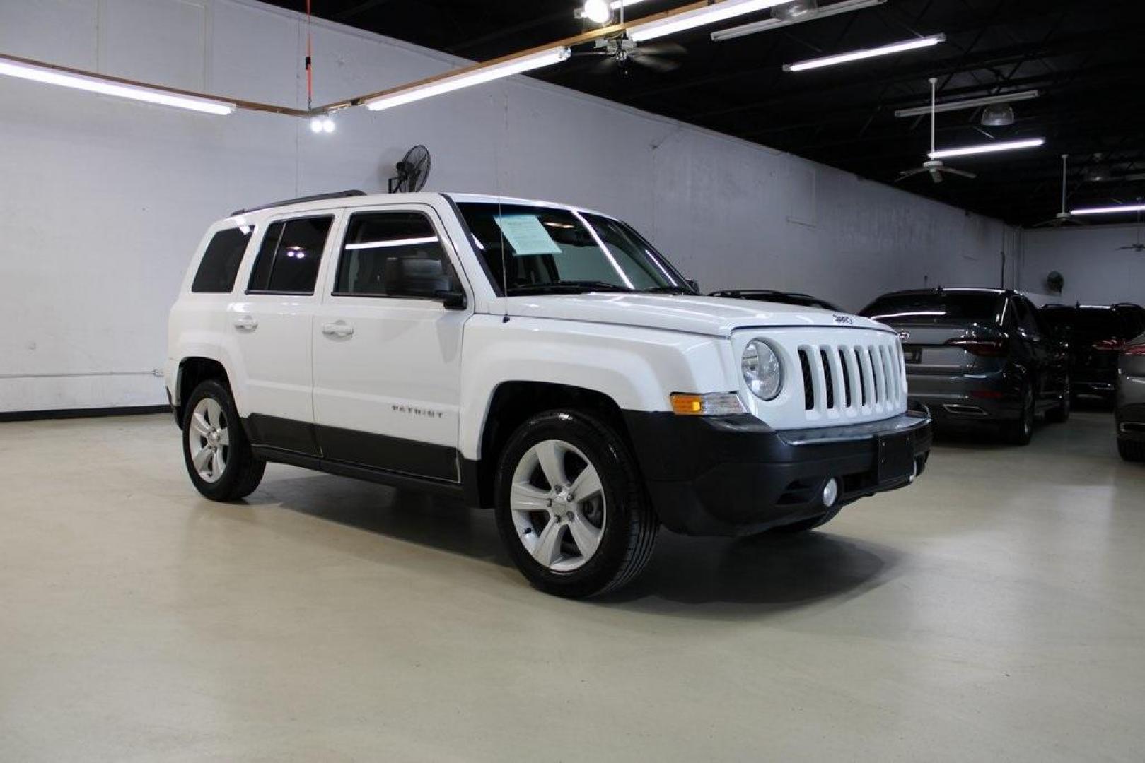 2017 Bright White Clearcoat /Dark Slate Gray Jeep Patriot Latitude (1C4NJPFA0HD) with an 2.0L I4 DOHC 16V Dual VVT engine, CVT transmission, located at 15300 Midway Rd., Addison, TX, 75001, (972) 702-0011, 32.958321, -96.838074 - Photo#7