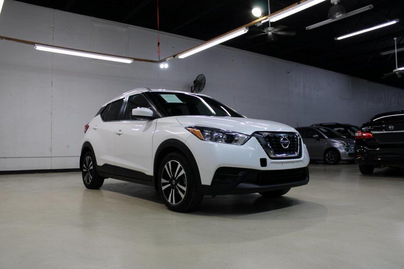 2019 Aspen White Tricoat /Charcoal Nissan Kicks SV (3N1CP5CU4KL) with an 1.6L 4-Cylinder DOHC 16V engine, CVT transmission, located at 15300 Midway Rd., Addison, TX, 75001, (972) 702-0011, 32.958321, -96.838074 - Photo#1