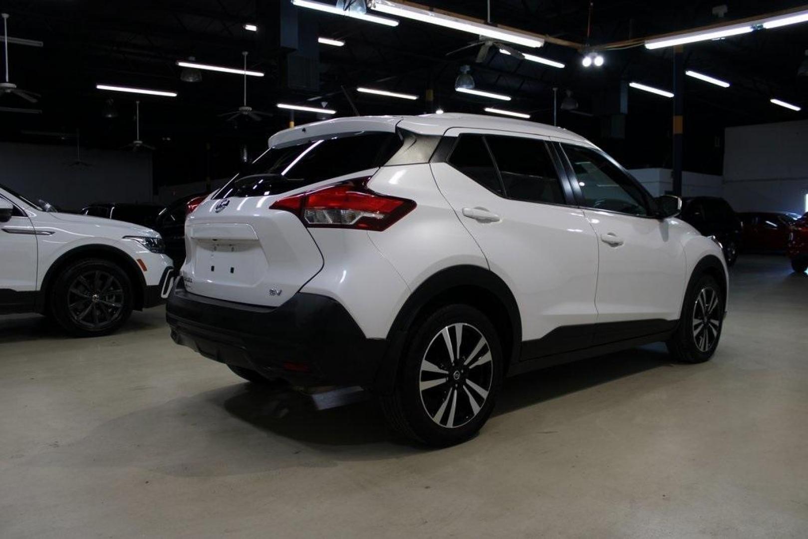 2019 Aspen White Tricoat /Charcoal Nissan Kicks SV (3N1CP5CU4KL) with an 1.6L 4-Cylinder DOHC 16V engine, CVT transmission, located at 15300 Midway Rd., Addison, TX, 75001, (972) 702-0011, 32.958321, -96.838074 - Photo#2