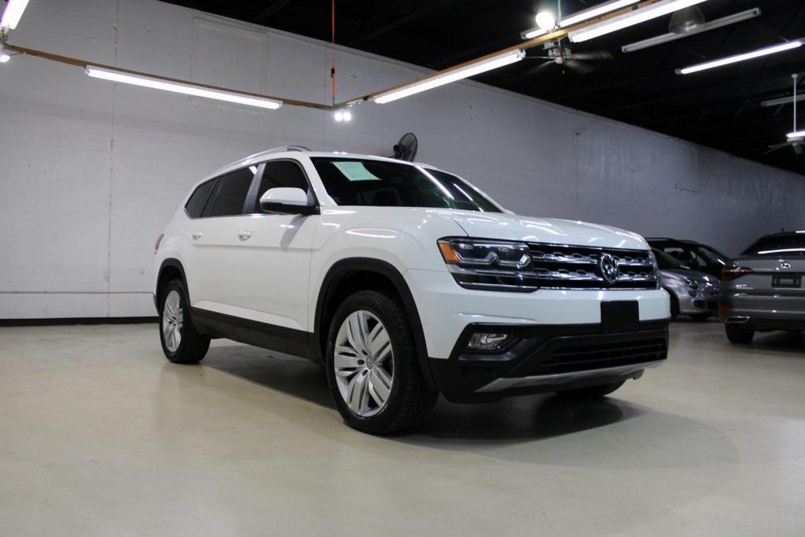 2019 Deep Black Pearl /Titan Black Volkswagen Atlas 3.6L V6 SE (1V2WR2CA7KC) with an 3.6L VR6 engine, Automatic transmission, located at 15300 Midway Rd., Addison, TX, 75001, (972) 702-0011, 32.958321, -96.838074 - HOME OF THE NO HAGGLE PRICE - WHOLESALE PRICES TO THE PUBLIC!! Atlas 3.6L V6 SE w/Technology, 4D Sport Utility, 3.6L VR6, 8-Speed Automatic with Tiptronic, FWD.<br><br>Deep Black Pearl 2019 Volkswagen Atlas 3.6L V6 SE<br><br><br>Awards:<br> * 2019 KBB.com 12 Best Family Cars * 2019 KBB.com 10 Bes - Photo#1