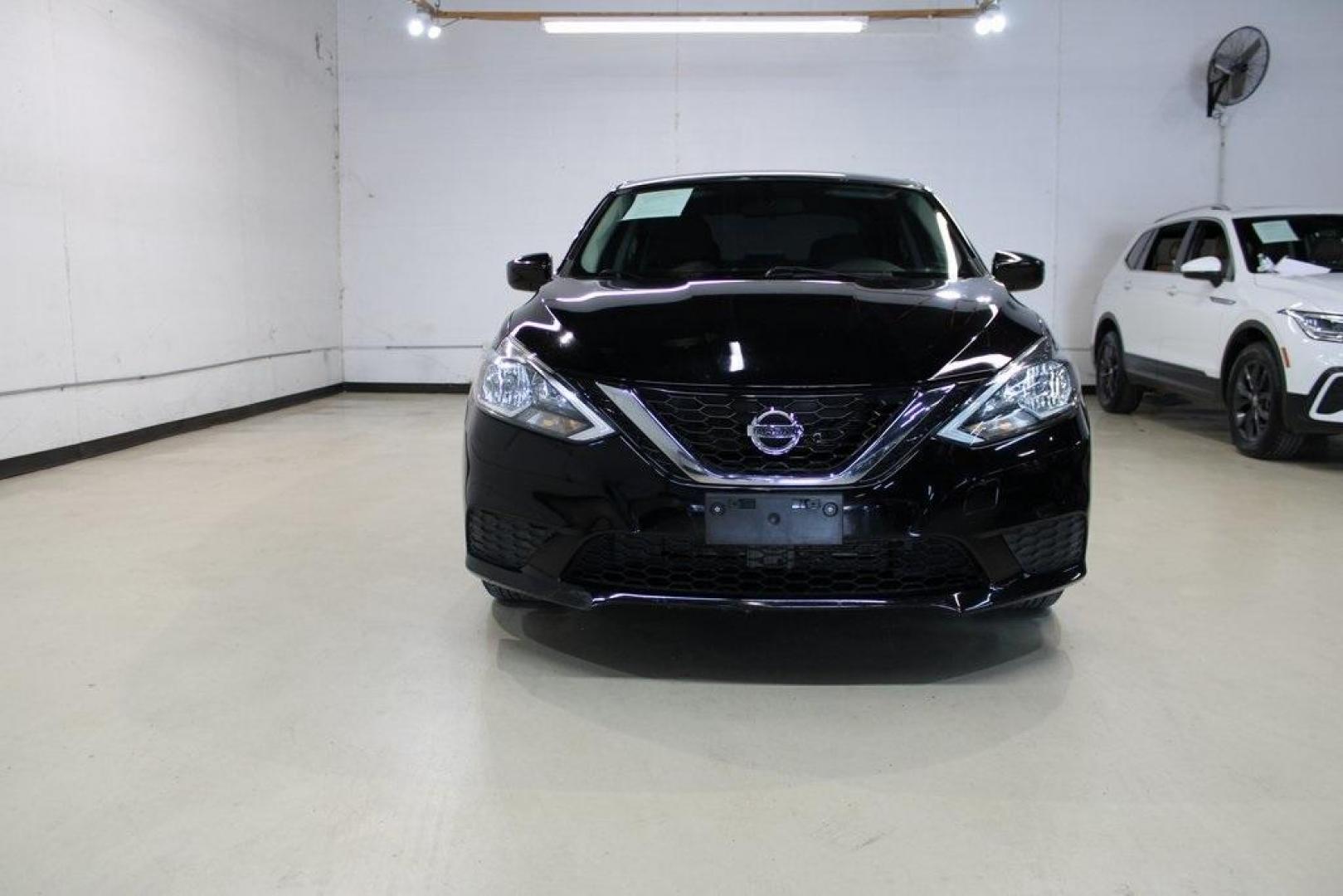 2017 Super Black /Charcoal Nissan Sentra SV (3N1AB7AP7HY) with an 1.8L 4-Cylinder DOHC 16V engine, CVT transmission, located at 15300 Midway Rd., Addison, TX, 75001, (972) 702-0011, 32.958321, -96.838074 - HOME OF THE NO HAGGLE PRICE - WHOLESALE PRICES TO THE PUBLIC!! Sentra SV, 4D Sedan, 1.8L 4-Cylinder DOHC 16V, CVT with Xtronic, FWD, Super Black, Charcoal Cloth.<br><br>Super Black 2017 Nissan Sentra SV<br><br>29/37 City/Highway MPG<br><br><br>At Midway Auto Group, we strive to provide you with the - Photo#5