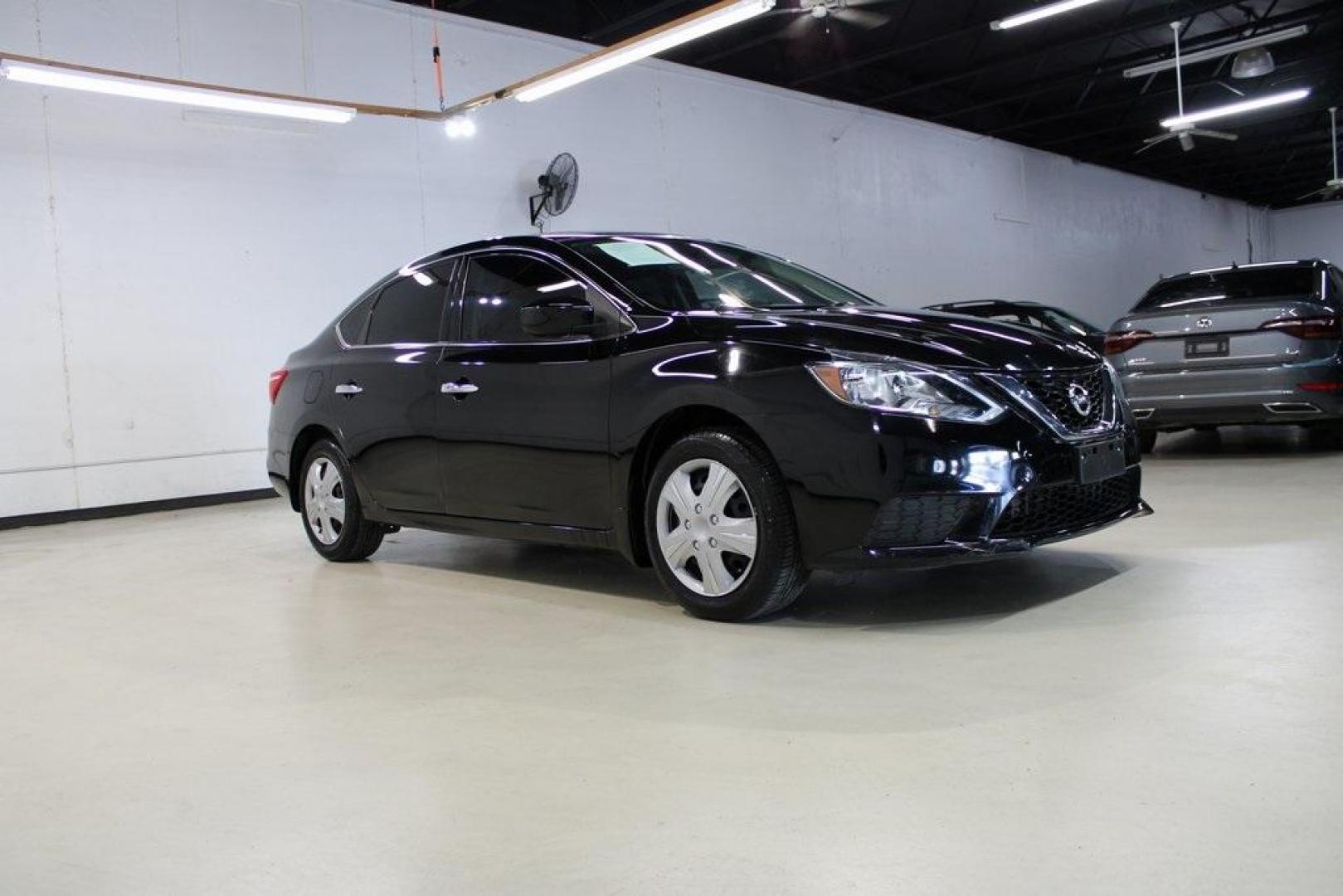 2017 Super Black /Charcoal Nissan Sentra SV (3N1AB7AP7HY) with an 1.8L 4-Cylinder DOHC 16V engine, CVT transmission, located at 15300 Midway Rd., Addison, TX, 75001, (972) 702-0011, 32.958321, -96.838074 - HOME OF THE NO HAGGLE PRICE - WHOLESALE PRICES TO THE PUBLIC!! Sentra SV, 4D Sedan, 1.8L 4-Cylinder DOHC 16V, CVT with Xtronic, FWD, Super Black, Charcoal Cloth.<br><br>Super Black 2017 Nissan Sentra SV<br><br>29/37 City/Highway MPG<br><br><br>At Midway Auto Group, we strive to provide you with the - Photo#6