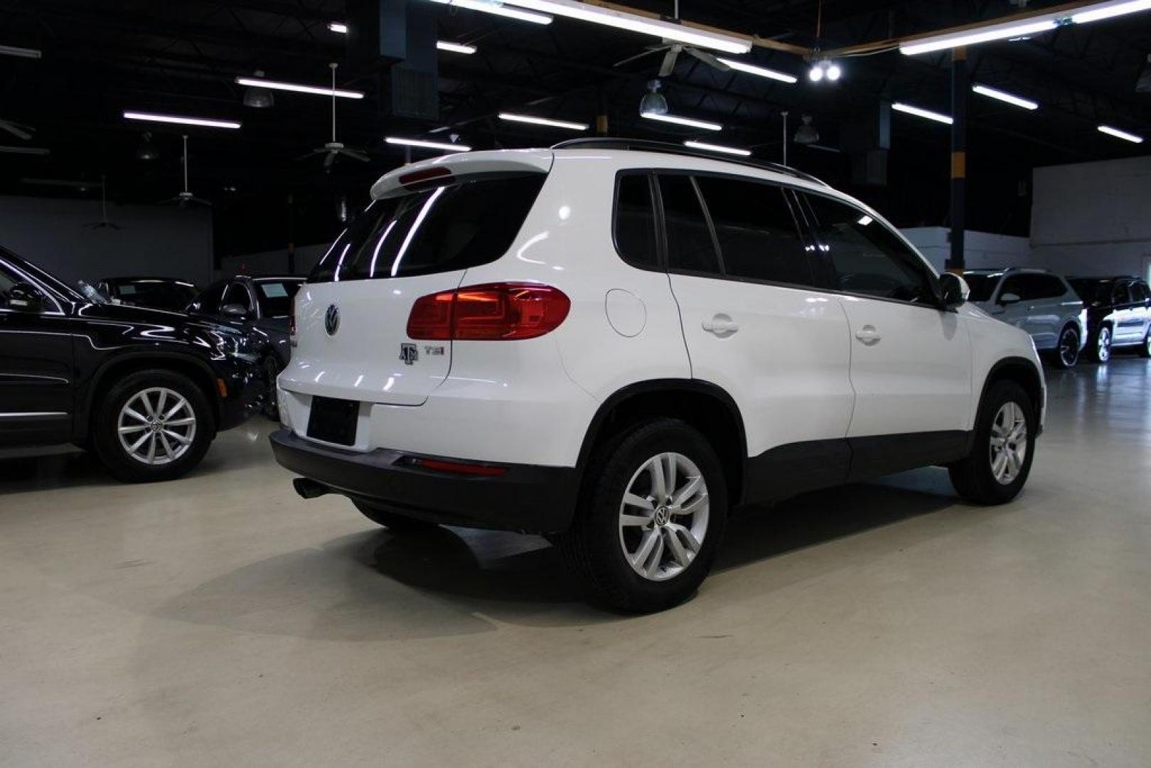 2016 Pure White Volkswagen Tiguan S (WVGAV7AX2GW) with an 2.0L 4-Cylinder Turbocharged engine, Automatic transmission, located at 15300 Midway Rd., Addison, TX, 75001, (972) 702-0011, 32.958321, -96.838074 - Photo#2