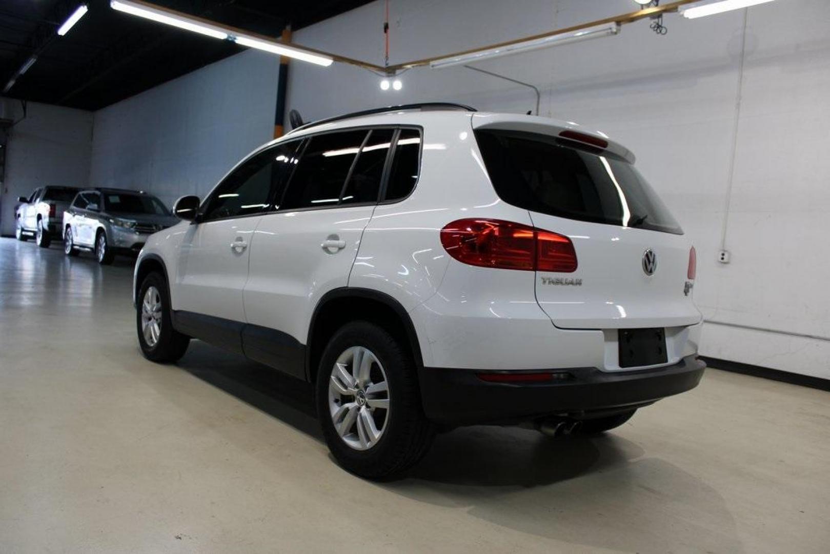 2016 Pure White Volkswagen Tiguan S (WVGAV7AX2GW) with an 2.0L 4-Cylinder Turbocharged engine, Automatic transmission, located at 15300 Midway Rd., Addison, TX, 75001, (972) 702-0011, 32.958321, -96.838074 - Photo#3