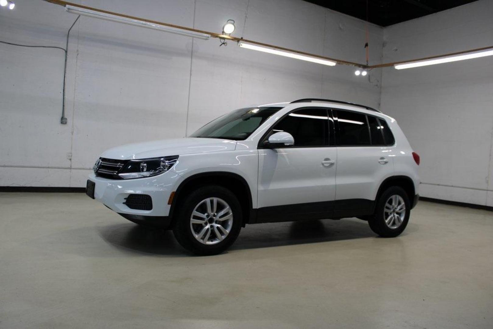 2016 Pure White Volkswagen Tiguan S (WVGAV7AX2GW) with an 2.0L 4-Cylinder Turbocharged engine, Automatic transmission, located at 15300 Midway Rd., Addison, TX, 75001, (972) 702-0011, 32.958321, -96.838074 - Photo#4