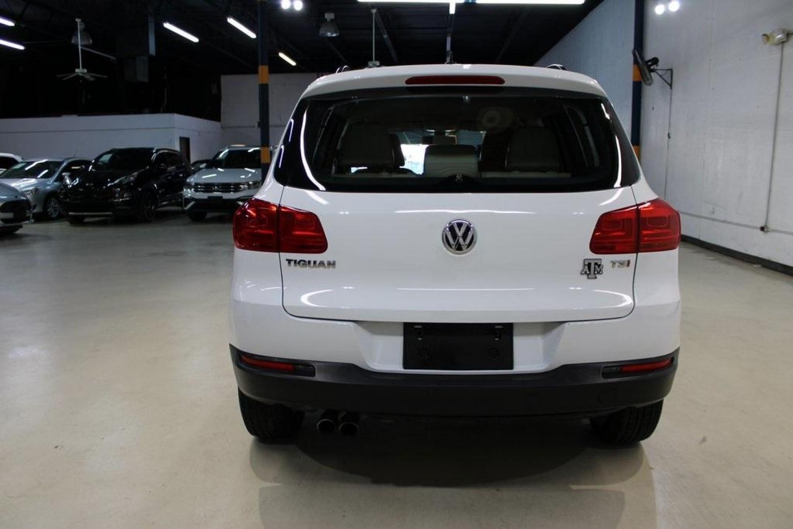 2016 Pure White Volkswagen Tiguan S (WVGAV7AX2GW) with an 2.0L 4-Cylinder Turbocharged engine, Automatic transmission, located at 15300 Midway Rd., Addison, TX, 75001, (972) 702-0011, 32.958321, -96.838074 - Photo#7