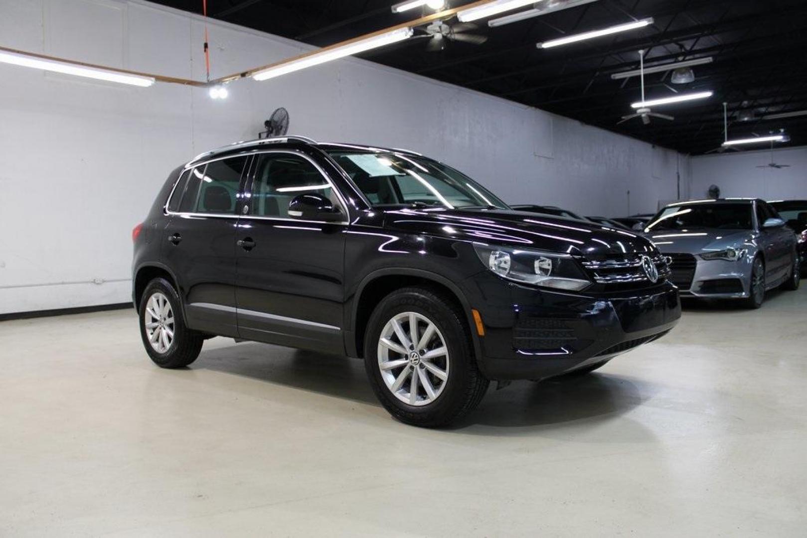 2017 Deep Black Pearl Volkswagen Tiguan 2.0T Wolfsburg Edition (WVGRV7AX9HW) with an 2.0L TSI DOHC engine, Automatic transmission, located at 15300 Midway Rd., Addison, TX, 75001, (972) 702-0011, 32.958321, -96.838074 - Photo#6