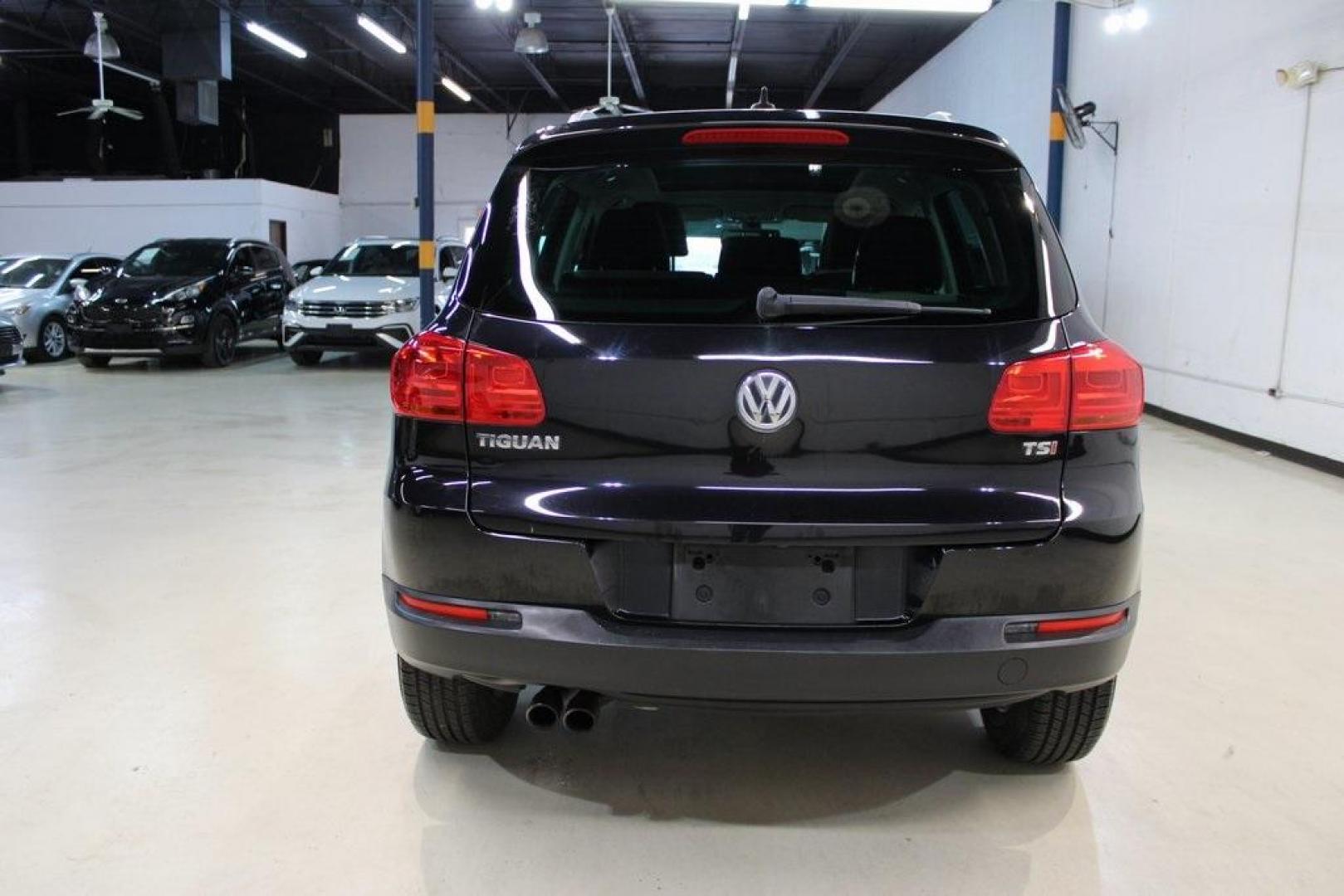 2017 Deep Black Pearl Volkswagen Tiguan 2.0T Wolfsburg Edition (WVGRV7AX9HW) with an 2.0L TSI DOHC engine, Automatic transmission, located at 15300 Midway Rd., Addison, TX, 75001, (972) 702-0011, 32.958321, -96.838074 - Photo#7