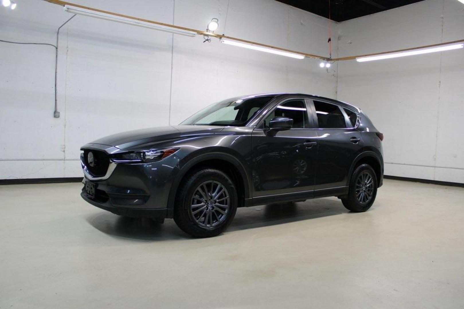 2020 Machine Gray Metallic /Black Mazda CX-5 Touring (JM3KFACM8L0) with an SKYACTIV 2.5L 4-Cylinder DOHC 16V engine, Automatic transmission, located at 15300 Midway Rd., Addison, TX, 75001, (972) 702-0011, 32.958321, -96.838074 - Photo#5