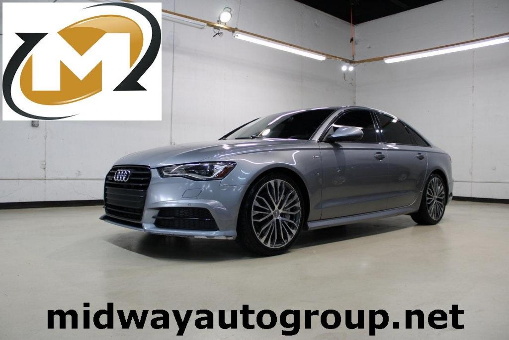 2016 Florett Silver Metallic Audi A6 2.0T Premium (WAUFFAFC0GN) with an 2.0L 4-Cylinder TFSI engine, Automatic transmission, located at 15300 Midway Rd., Addison, TX, 75001, (972) 702-0011, 32.958321, -96.838074 - Photo#0